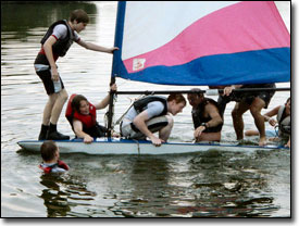 Having fun in a topper dinghy
